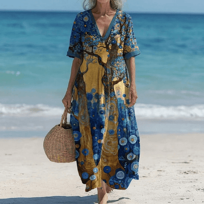 Elegant women's mid-length dress with a chic loose fit, perfect for summer and formal occasions, featuring a stylish design and comfortable fabric. 2