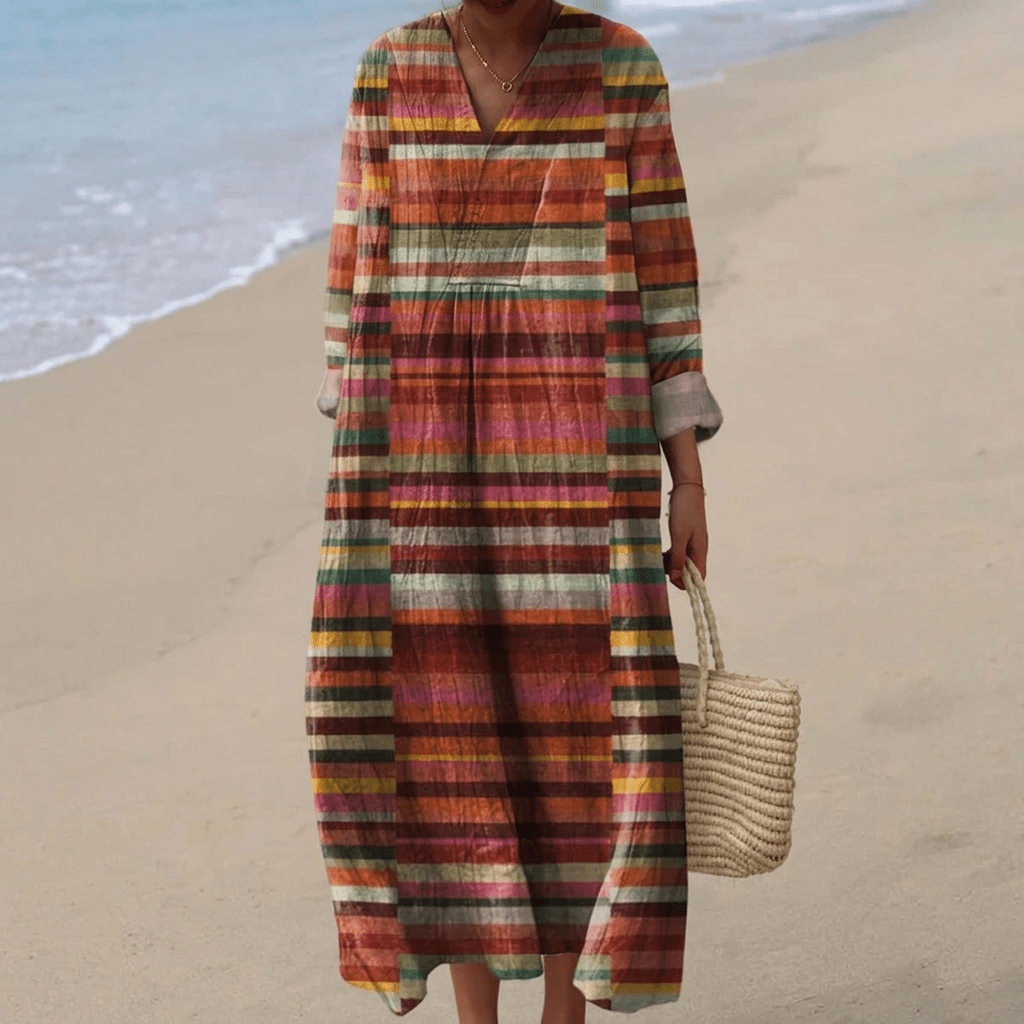 Elegant women's mid-length dress with a chic loose fit, perfect for summer and formal occasions, featuring a stylish design and comfortable fabric. 1