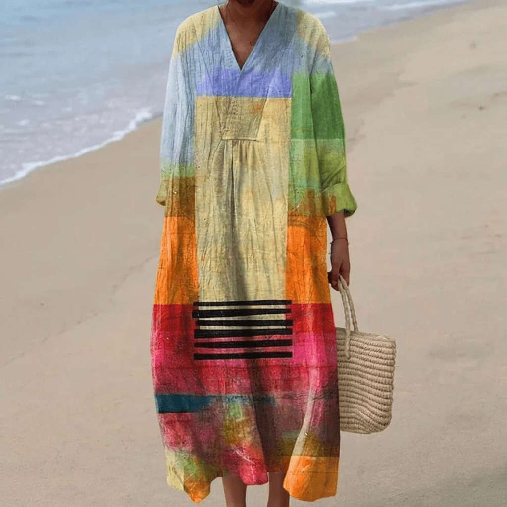 Elegant women's mid-length dress with a chic loose fit, perfect for summer and formal occasions, featuring a stylish design and comfortable fabric. 9