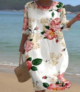 Womens floral cotton summer dress featuring a flattering cut, perfect for wedding guests and formal events. 3