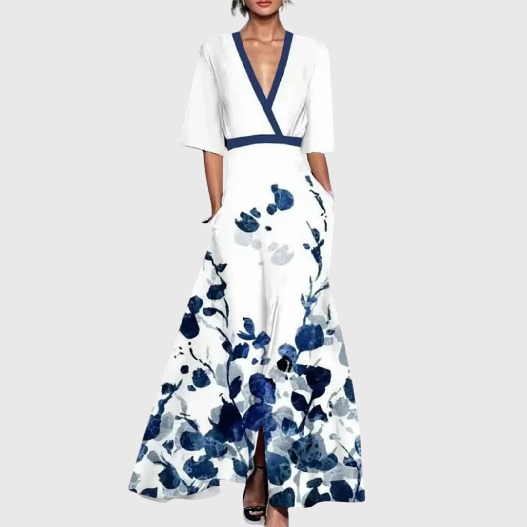 Womens dress featuring a flattering silhouette and vibrant floral design, made from soft breathable fabric, perfect for spring occasions. 1