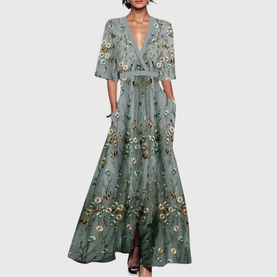 Womens dress featuring a flattering silhouette and vibrant floral design, made from soft breathable fabric, perfect for spring occasions. 2