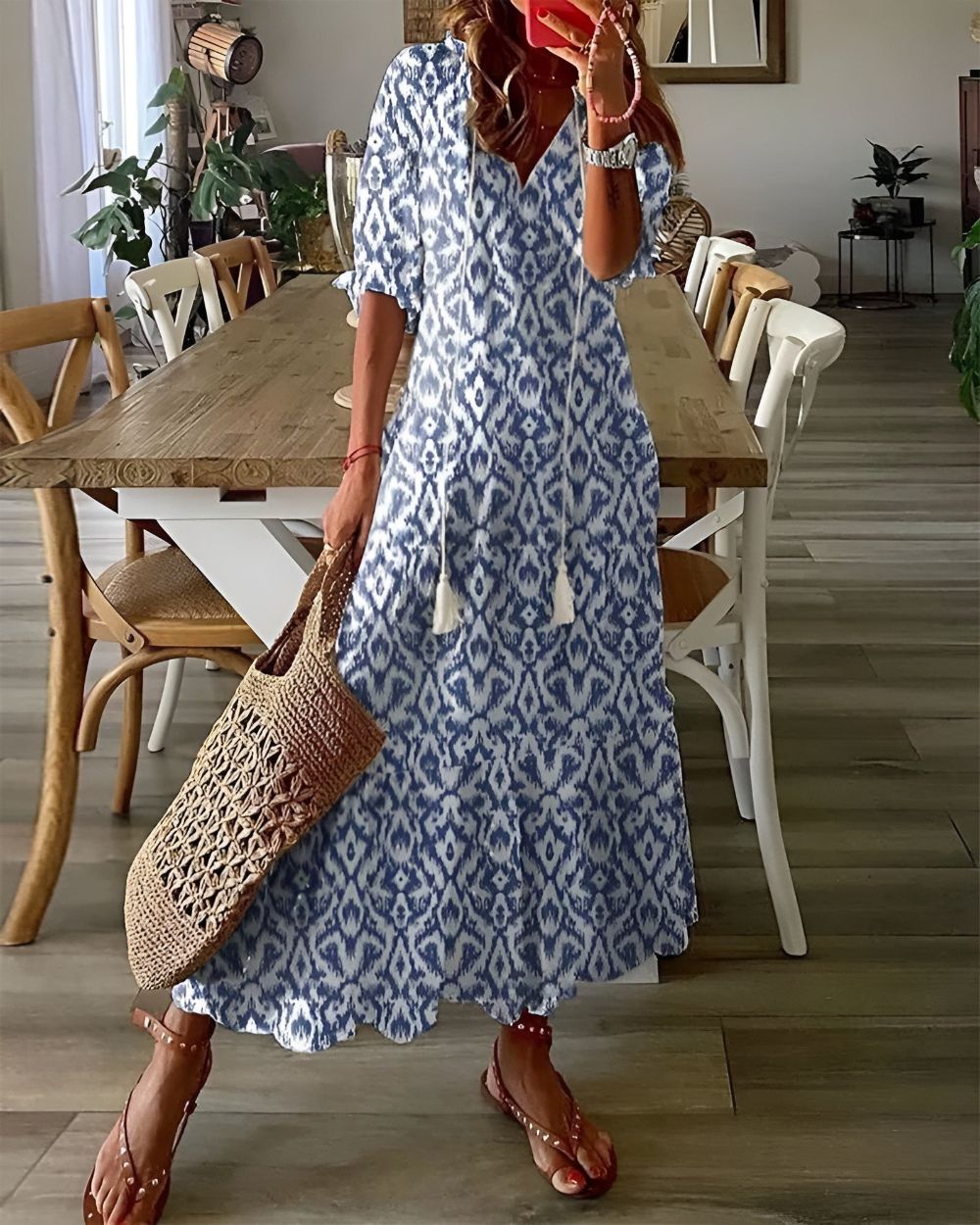 Lightweight summer boho style women's dress featuring a flowy fit and stylish tassel details, perfect for warm weather outings. 0