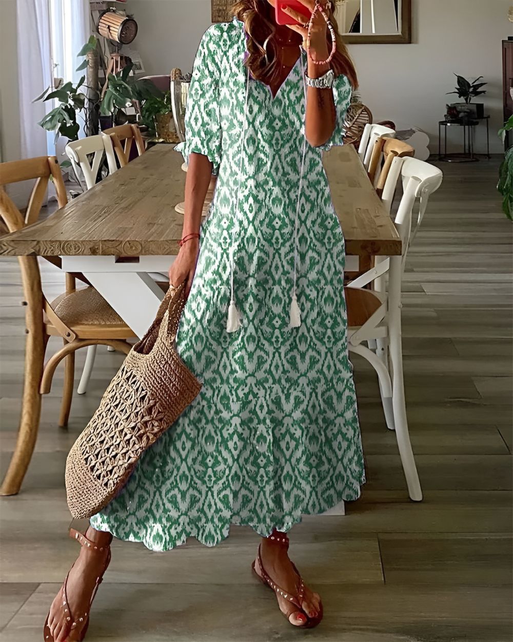 Lightweight summer boho style women's dress featuring a flowy fit and stylish tassel details, perfect for warm weather outings. 1