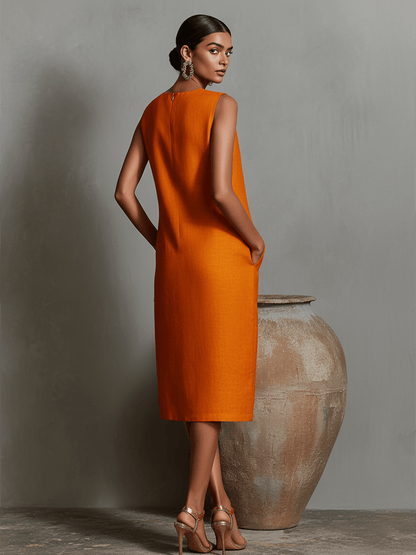 Womens sleeveless dress featuring a minimalist shift design, made from breathable linen fabric, with convenient side pockets for added functionality. 4