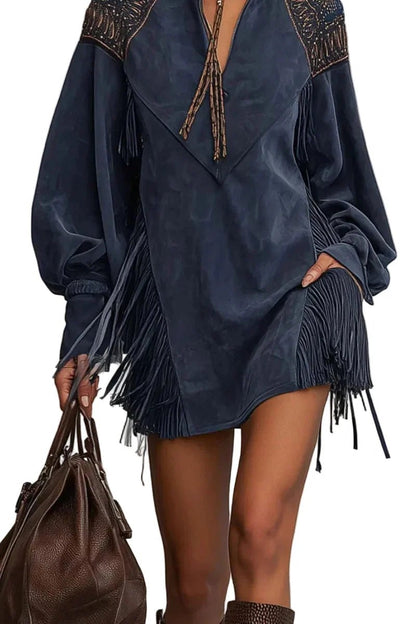 Women's indigo faux suede dress featuring a zip-up stand collar, intricate embroidery, relaxed fit, and stylish tassels. 2