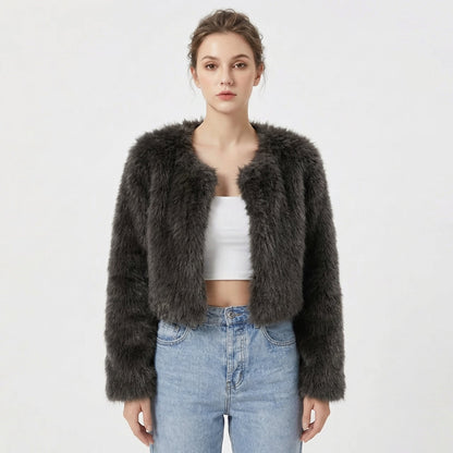 Women's faux fur jacket featuring a stylish cropped silhouette, perfect for adding a soft, lightweight layer to winter outfits, ideal for elegant evening wear. 1