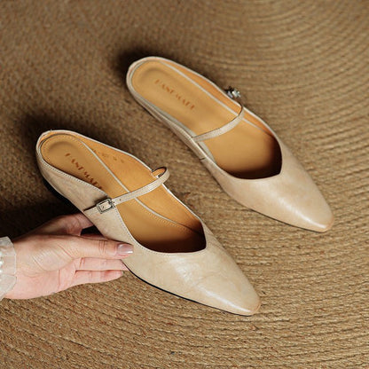 Women's black leather flats featuring a buckle strap and pointed-toe slip-on Mary Jane design, perfect for stylish and comfortable everyday wear. 5