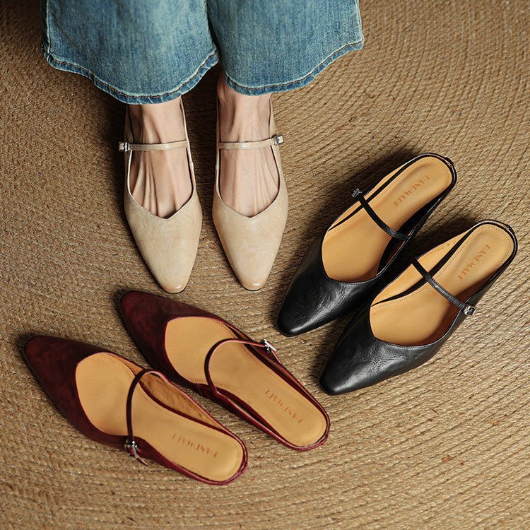 Women's black leather flats featuring a buckle strap and pointed-toe slip-on Mary Jane design, perfect for stylish and comfortable everyday wear. 8