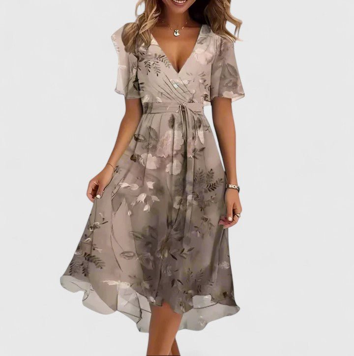 Women's floral dress featuring a high-low hem and flutter sleeves, perfect for elegant summer garden parties. 7