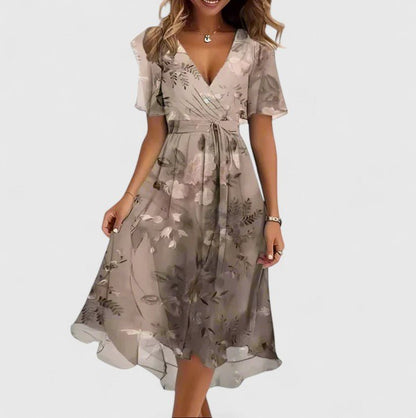 Women's floral dress featuring a high-low hem and flutter sleeves, perfect for elegant summer garden parties. 7