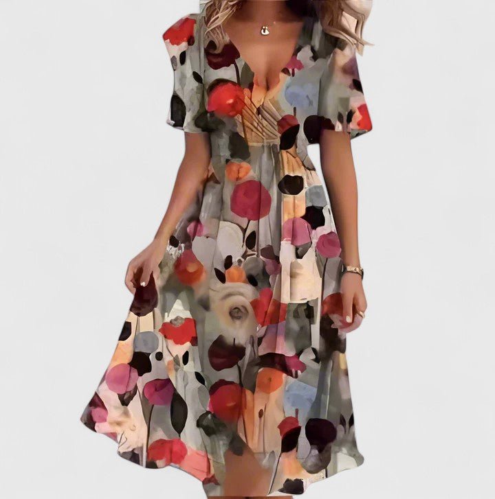 Women's floral dress featuring a high-low hem and flutter sleeves, perfect for elegant summer garden parties. 4