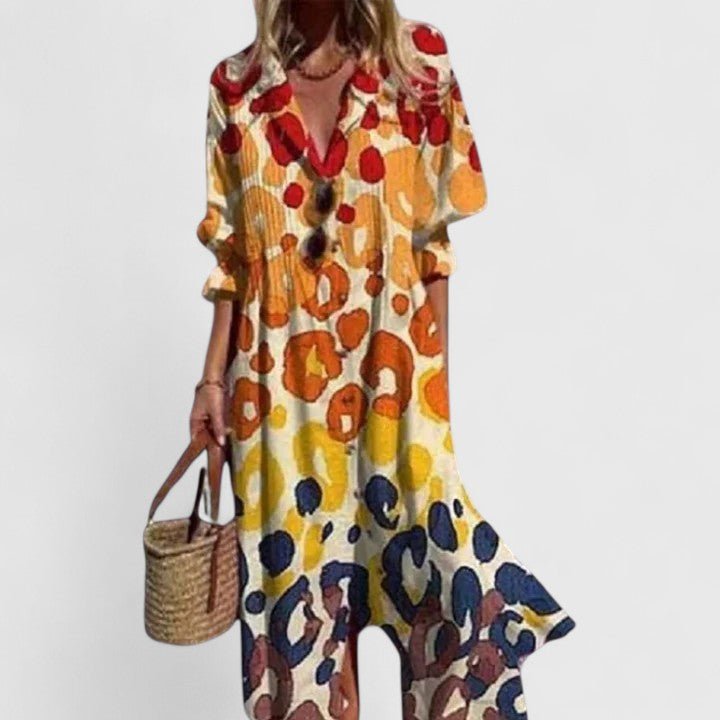 Women's floral midi dress featuring a button front design, perfect for vibrant summer outings and casual occasions. 3