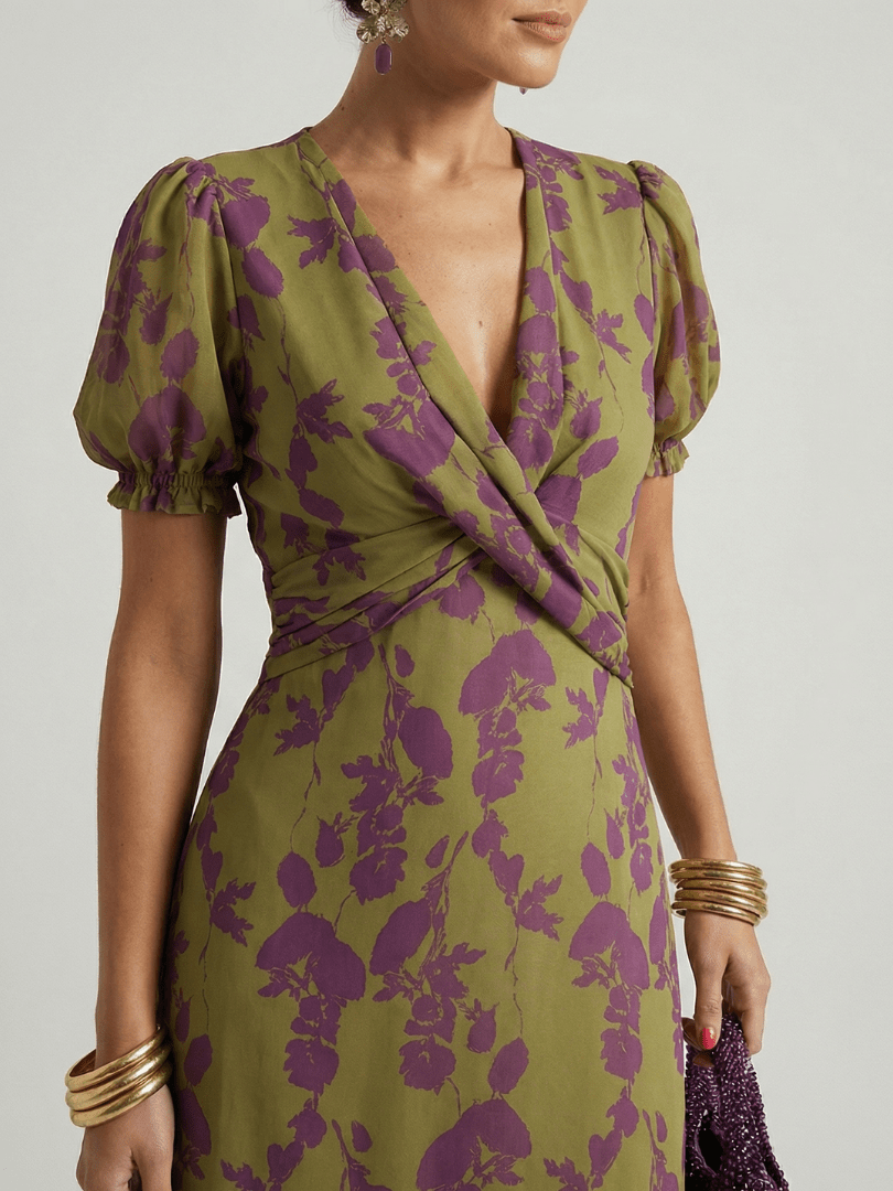 Womens floral midi dress featuring a wrap bodice and short sleeves, perfect for summer, made from lightweight fabric for comfort and style. 2