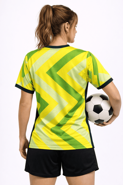 Women's Australia team colors football shirt featuring a crew neck, short sleeves, and a casual sportswear design in vibrant green and gold. 1