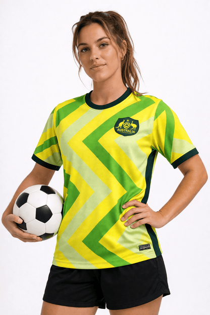 Women's Australia team colors football shirt featuring a crew neck, short sleeves, and a casual sportswear design in vibrant green and gold. 0