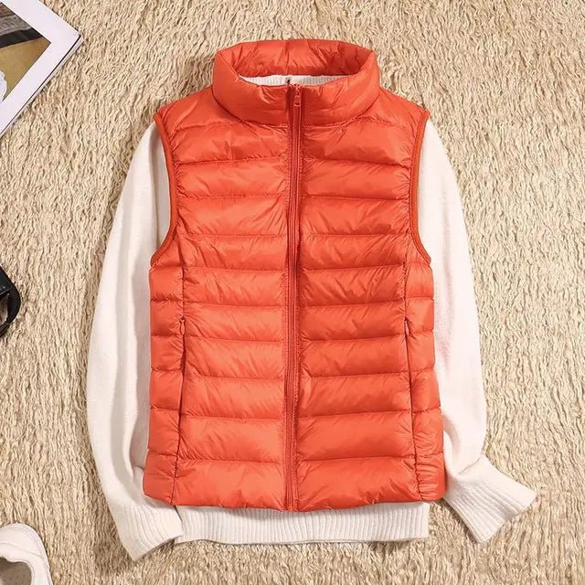 Lightweight women's gilet featuring windproof protection and a fitted design, perfect for layering and outdoor activities. 4