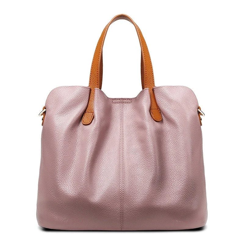Women's genuine cowhide leather handbag with adjustable strap, featuring a spacious design ideal for everyday use. 3