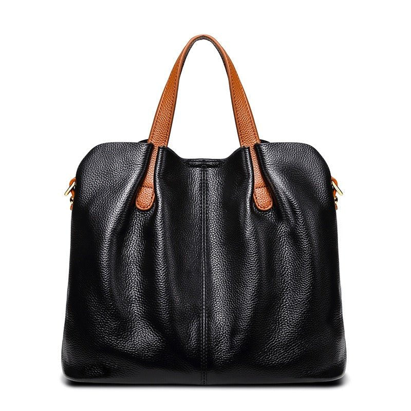 Women's genuine cowhide leather handbag with adjustable strap, featuring a spacious design ideal for everyday use. 5