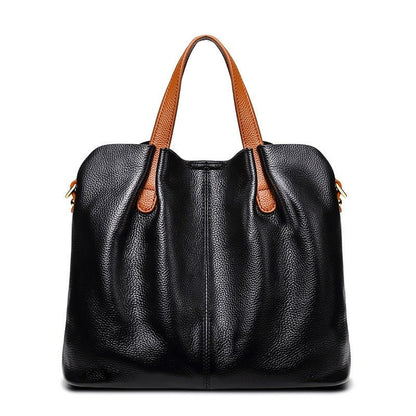 Women's genuine cowhide leather handbag with adjustable strap, featuring a spacious design ideal for everyday use. 5