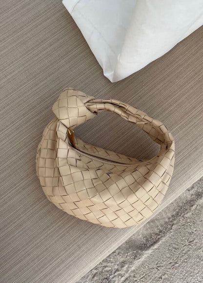 Women's vegan leather handbag featuring a stylish woven grid design, perfect for adding elegance and practicality to any outfit or occasion. 8