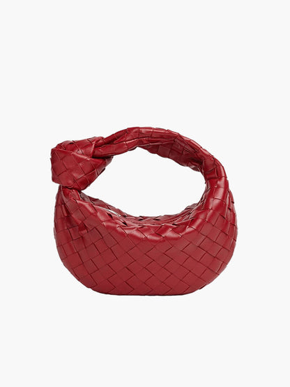 Women's vegan leather handbag featuring a stylish woven grid design, perfect for adding elegance and practicality to any outfit or occasion. 9