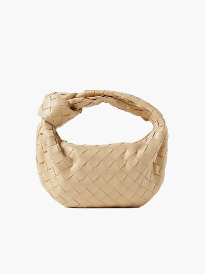 Women's vegan leather handbag featuring a stylish woven grid design, perfect for adding elegance and practicality to any outfit or occasion. 12