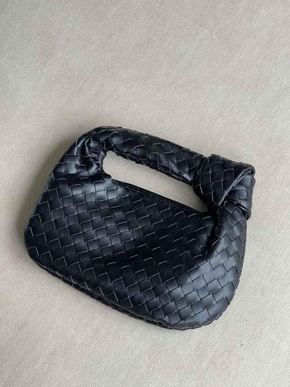Women's vegan leather handbag featuring a stylish woven grid design, perfect for adding elegance and practicality to any outfit or occasion. 7