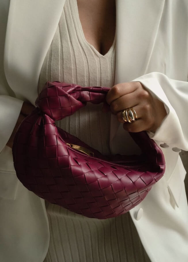 Women's vegan leather handbag featuring a stylish woven grid design, perfect for adding elegance and practicality to any outfit or occasion. 6