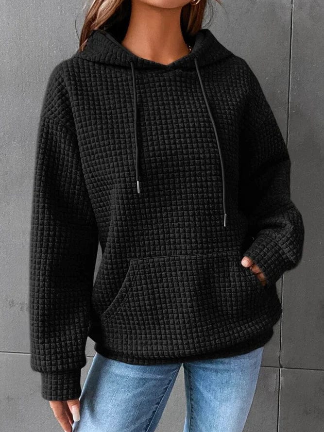 Women's relaxed waffle knit hoodie pullover featuring a drawstring hood and kangaroo pocket, perfect for everyday layering and casual wear. 0