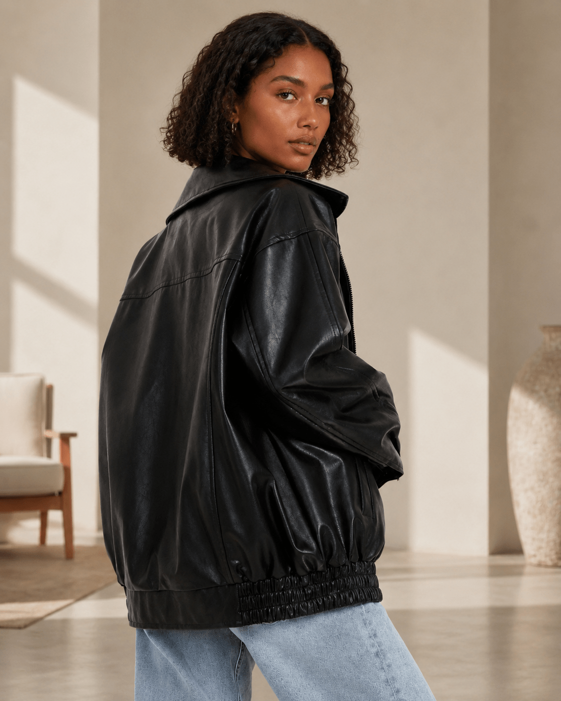 Women's oversized fit leather look jacket, perfect for casual everyday wear, featuring stylish design and comfortable fit. 7