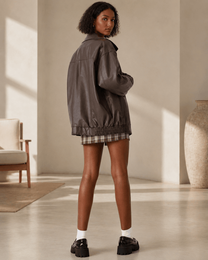 Women's oversized fit leather look jacket, perfect for casual everyday wear, featuring stylish design and comfortable fit. 3
