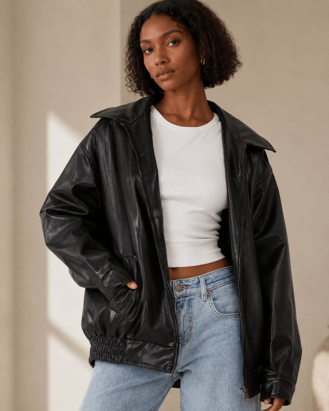 Women's oversized fit leather look jacket, perfect for casual everyday wear, featuring stylish design and comfortable fit. 6