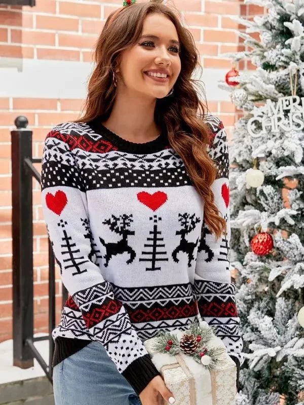 Women's cozy knitted jumper featuring a stylish animal print design, perfect for winter wear with a comfortable crew neck. 6