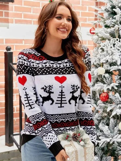Women's cozy knitted jumper featuring a stylish animal print design, perfect for winter wear with a comfortable crew neck. 6