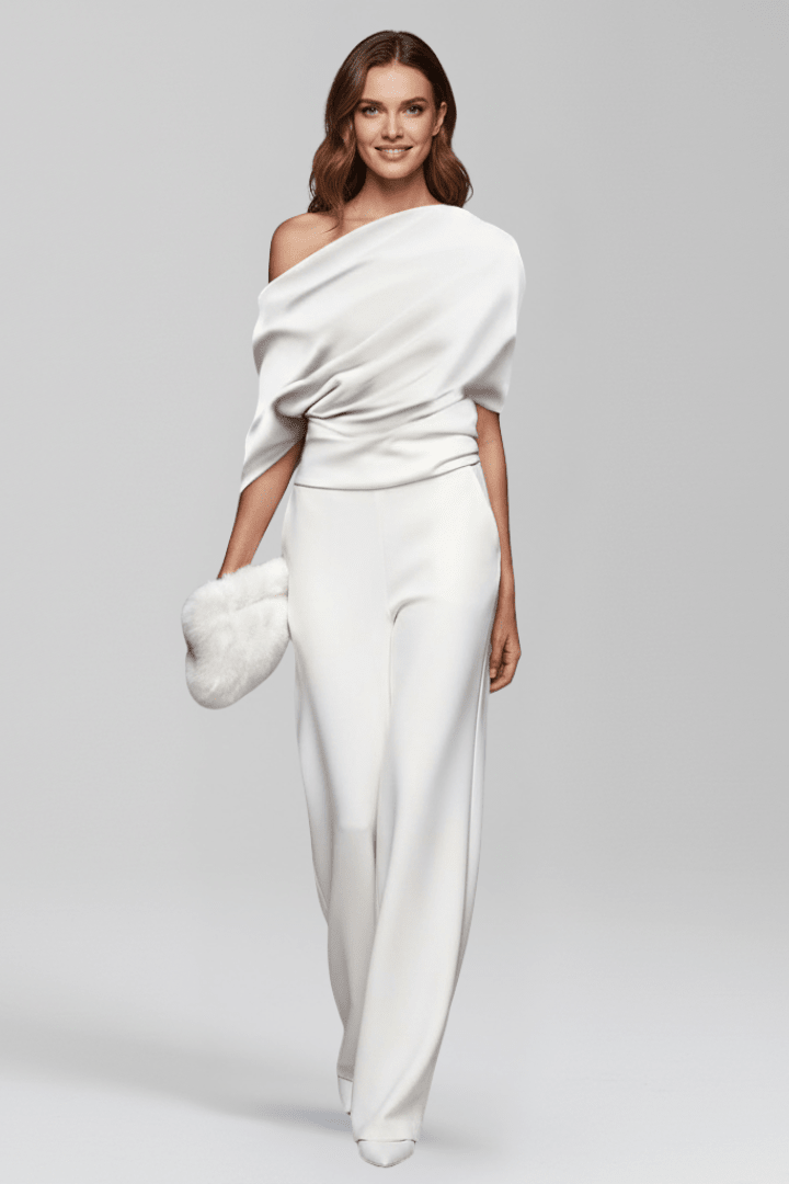 Elegant black women's jumpsuit featuring an asymmetric neckline and wide leg trousers, perfect for both casual and formal occasions. 5