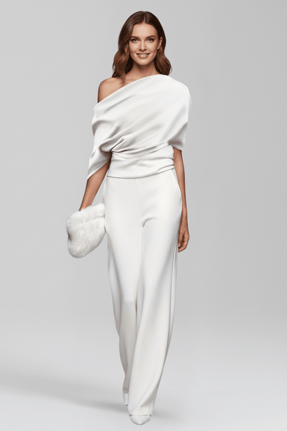 Elegant black women's jumpsuit featuring an asymmetric neckline and wide leg trousers, perfect for both casual and formal occasions. 5