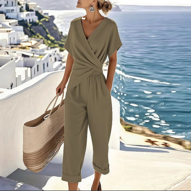 Women's jumpsuit featuring a stylish V-neck and short sleeves, perfect for elegant casual summer outings. 2