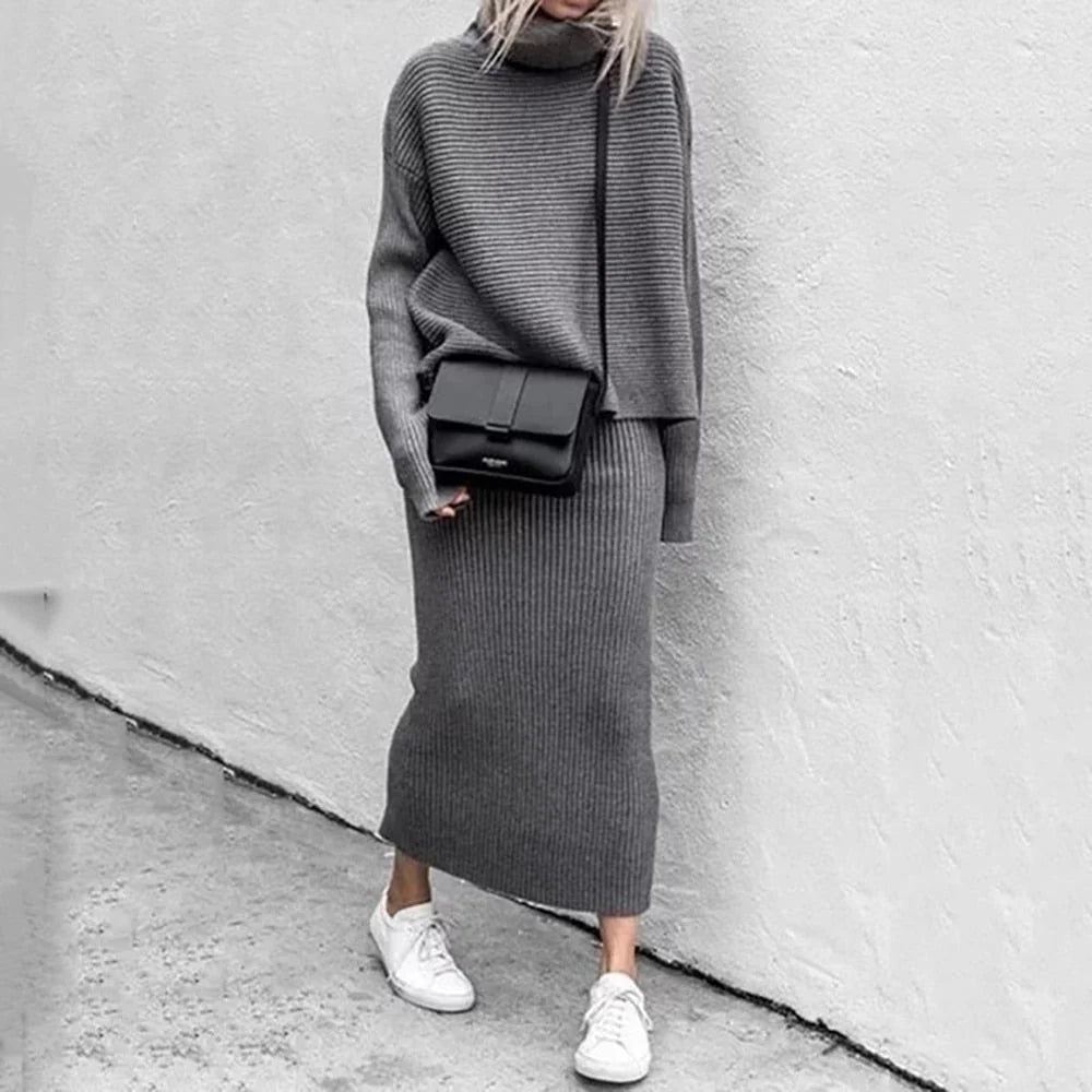 Women's knit top and maxi skirt co-ord set made from soft stretch fabric, featuring a relaxed fit for comfortable all-day wear. 2