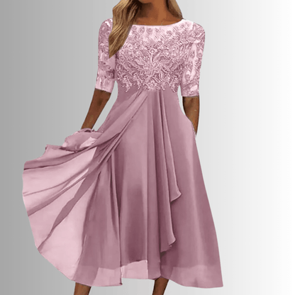 Elegant women's lace dress perfect for wedding guests and formal events, featuring a comfortable fit and intricate lace details. 1