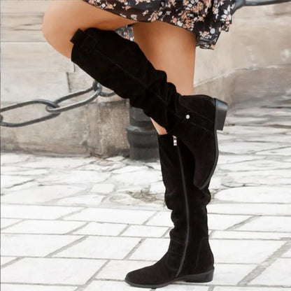 Women's leather boots featuring an elegant design, perfect for versatile everyday and formal wear, showcasing timeless style and sophistication. 1
