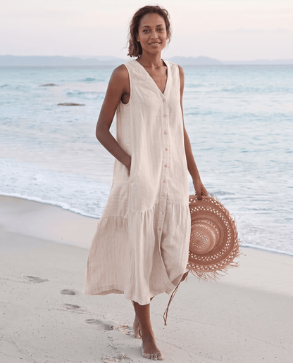 Women's linen midi dress featuring a stylish V-neck and a tiered skirt, perfect for casual beach wear in warm summer days. 10