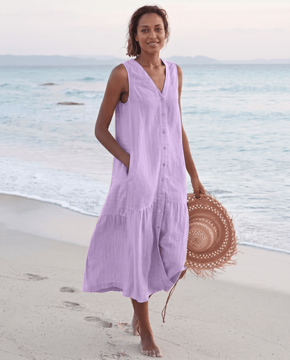 Women's linen midi dress featuring a stylish V-neck and a tiered skirt, perfect for casual beach wear in warm summer days. 3