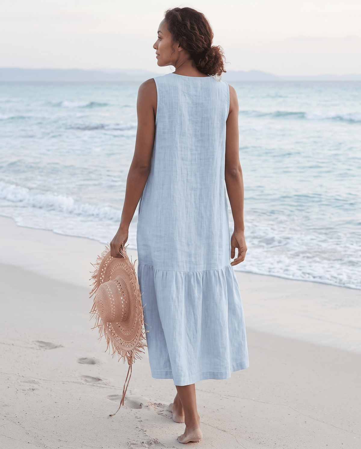 Women's linen midi dress featuring a stylish V-neck and a tiered skirt, perfect for casual beach wear in warm summer days. 1