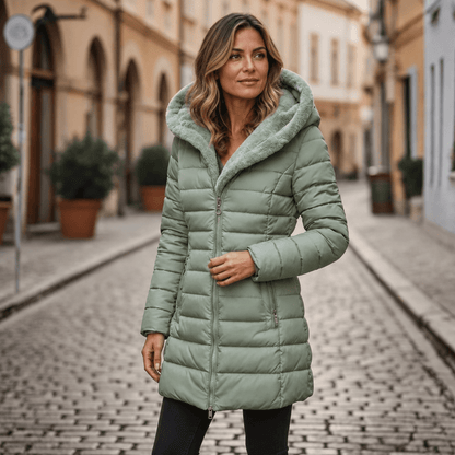 Women's long quilted black puffer jacket featuring an adjustable hood, designed for warmth and style in cold weather conditions. 5