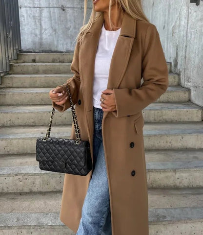 Women's long wool coat featuring a double-breasted design, elegant structured silhouette, and crafted from high-quality wool for stylish warmth and comfort. 6