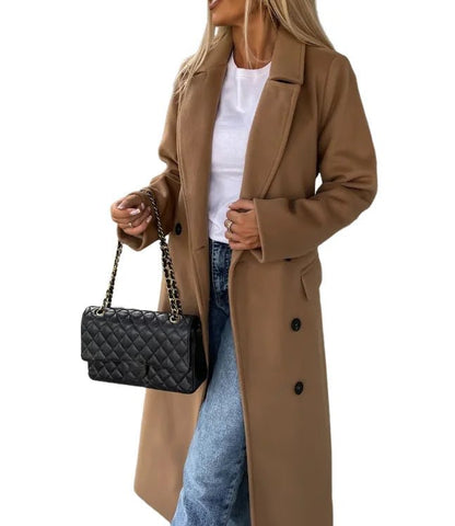 Women's long wool coat featuring a double-breasted design, elegant structured silhouette, and crafted from high-quality wool for stylish warmth and comfort. 1