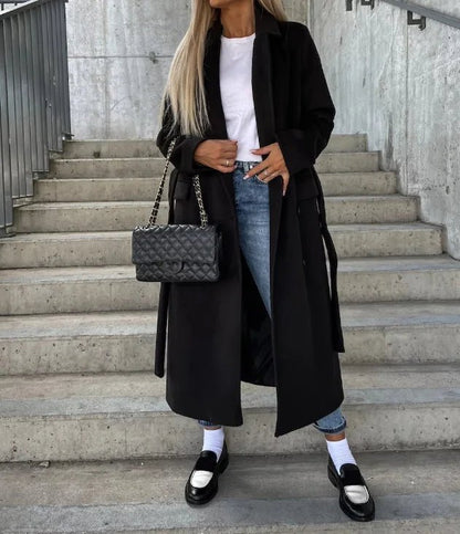 Women's long wool coat featuring a double-breasted design, elegant structured silhouette, and crafted from high-quality wool for stylish warmth and comfort. 5
