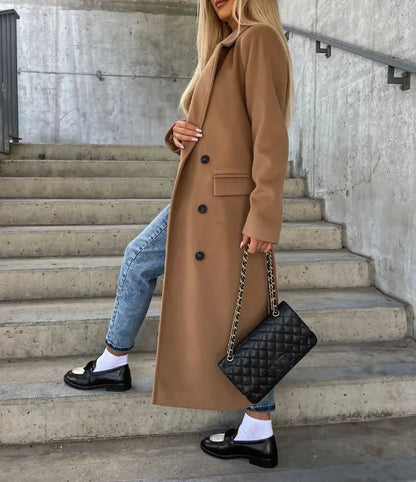 Women's long wool coat featuring a double-breasted design, elegant structured silhouette, and crafted from high-quality wool for stylish warmth and comfort. 2