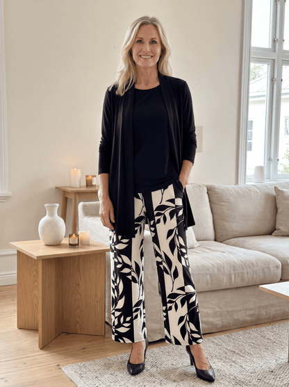 Women's loungewear set featuring a longline top and printed trousers, crafted from soft breathable fabric for ultimate casual comfort. 0